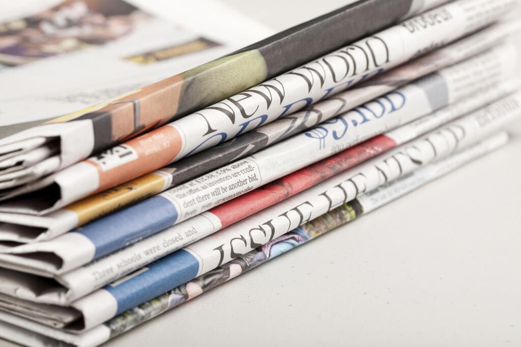 Stack of Newspapers PBM Reform Necessity: NACDS Cites Wall Street Journal