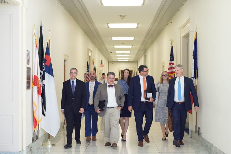 NACDS Policy Council members walk the halls of Rayburn House Office Building between meetings with legislators. NACDS Policy Council members walk the halls of Rayburn House Office Building between meetings with legislators.